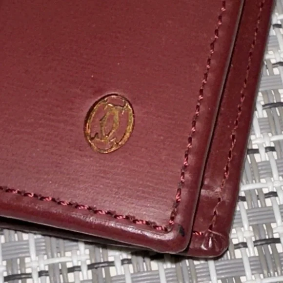 Pristine Pasha de Cartier Burgundy Leather Bifold & Coins Wallet with Gold Logo